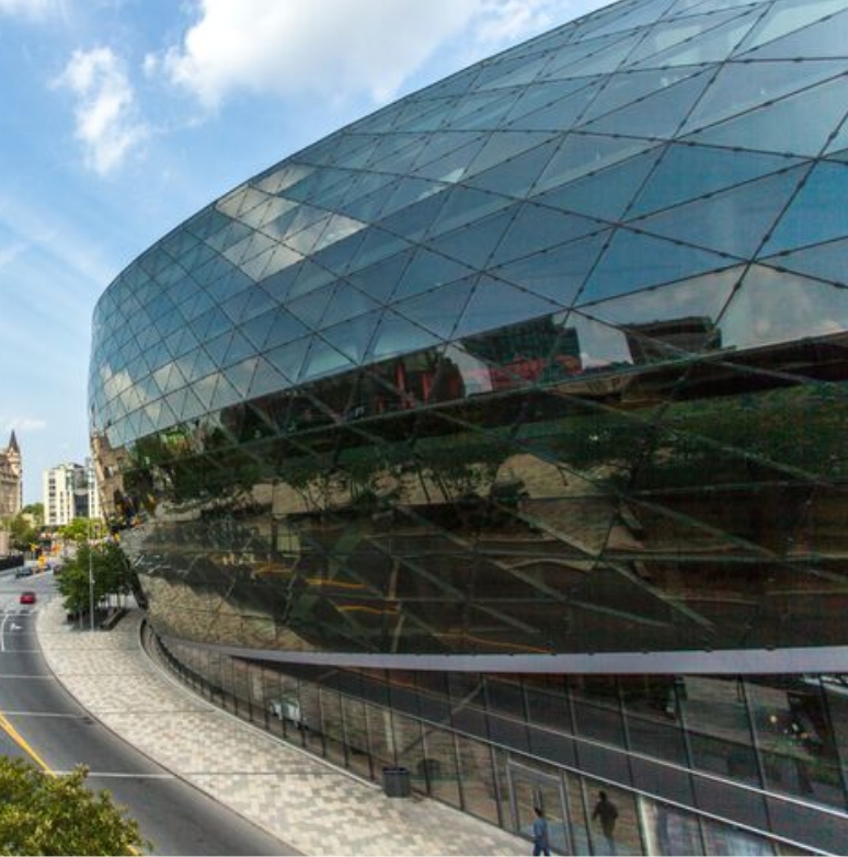 The Shaw Centre overlooks the Rideau Canal at midday.