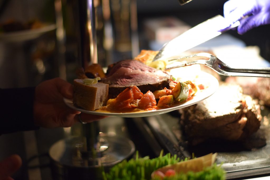 Steak dinner being served