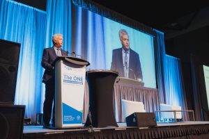 Man at podium talking