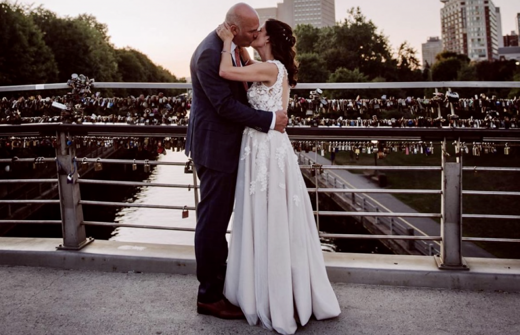 Couple Kissing on Love Lock Bridge