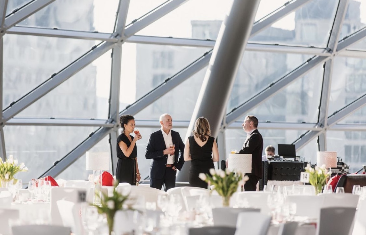 People talking in a circle in Trillium Ballroom