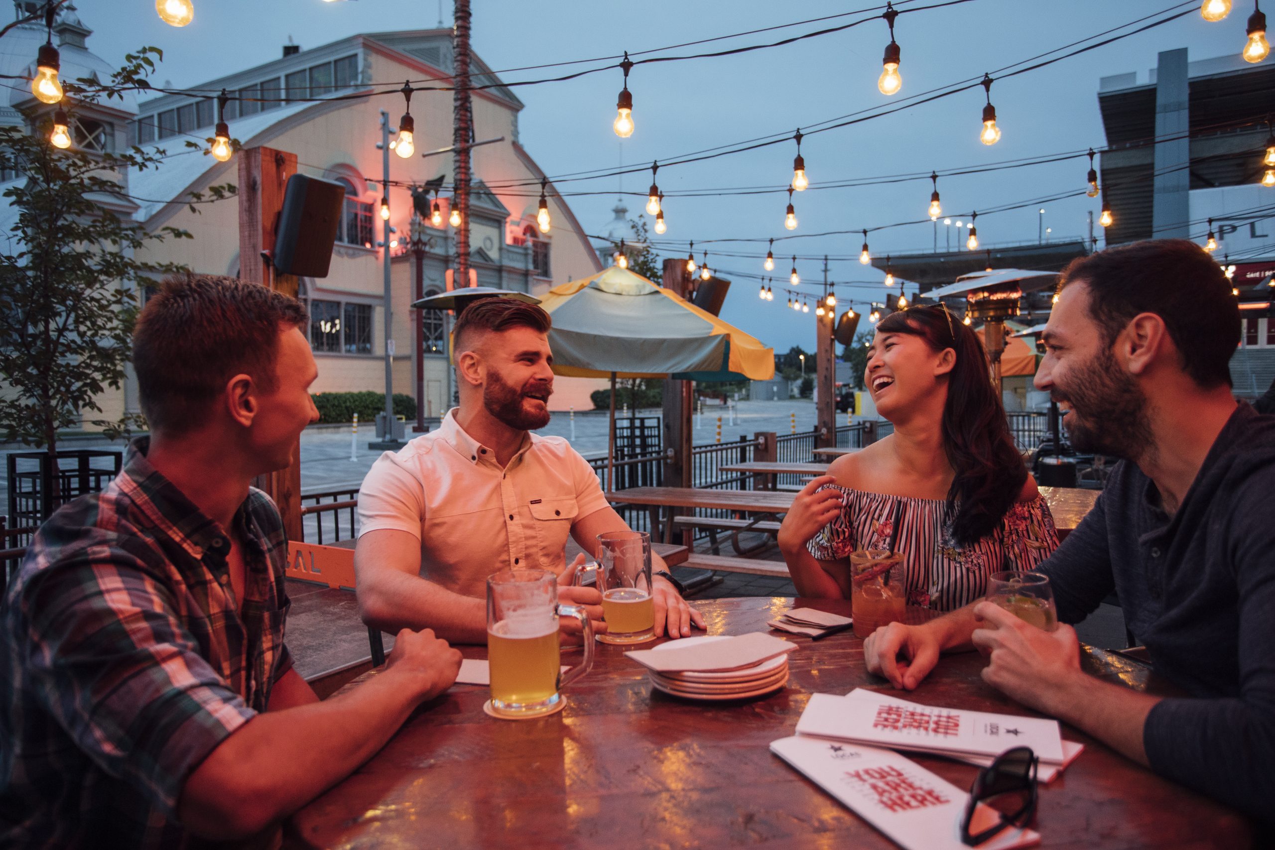 People laughing at table in Landsdowne restaurant