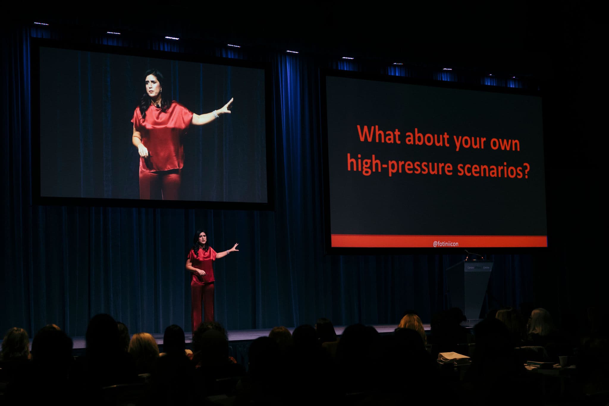 Fotini Iconomopoulos gives her speech on stage in Canada Hall 3