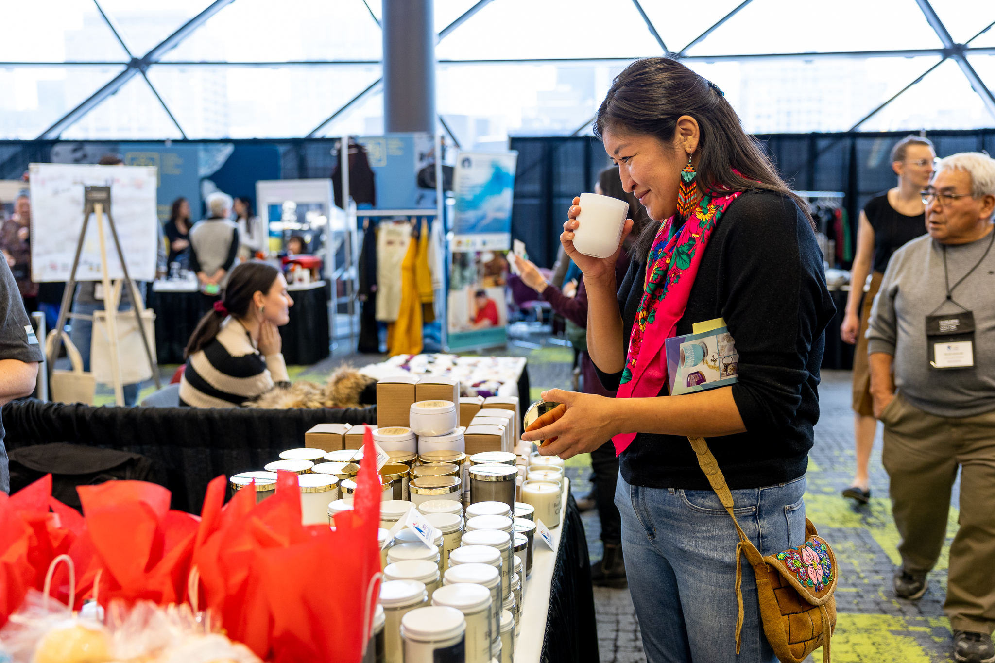 Women looking at jewelry on table