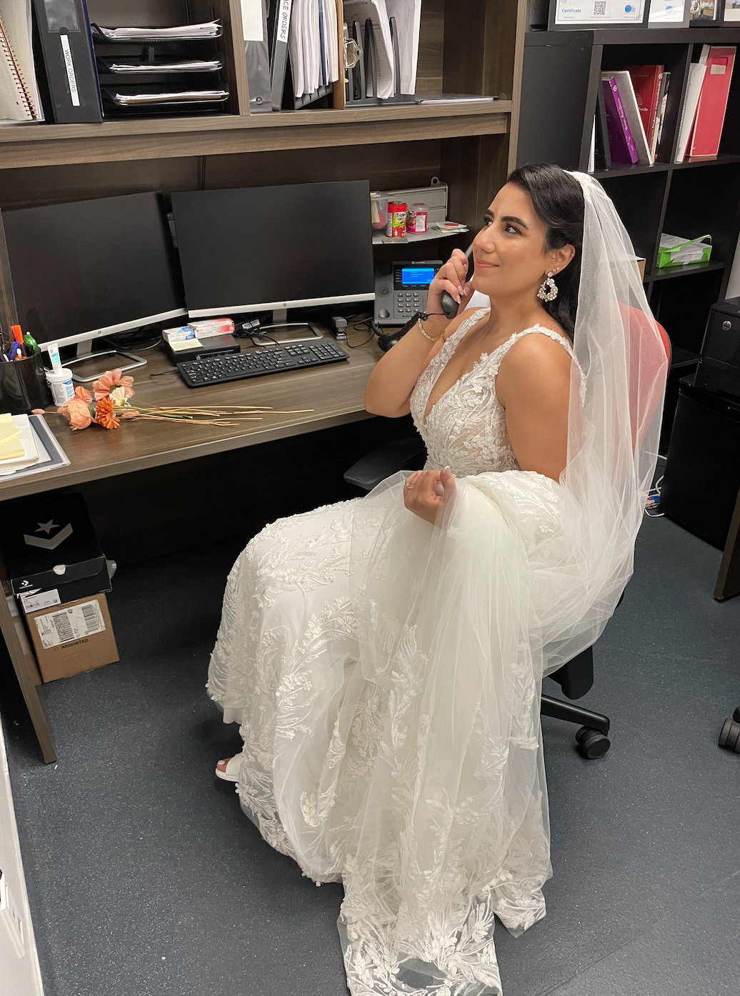 Jessica Samad Bride in her office on the phone